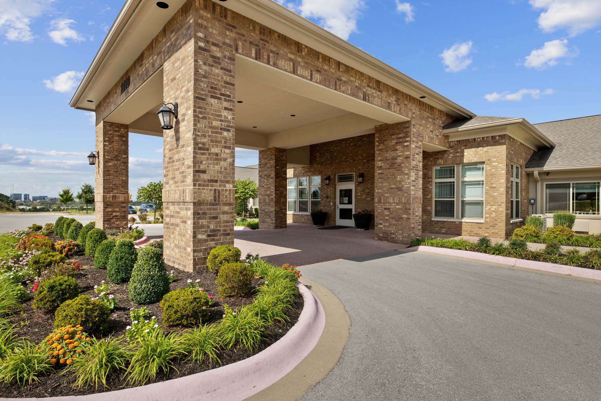 Grand Brook Memory Care of Rogers at Promenade community photo 1